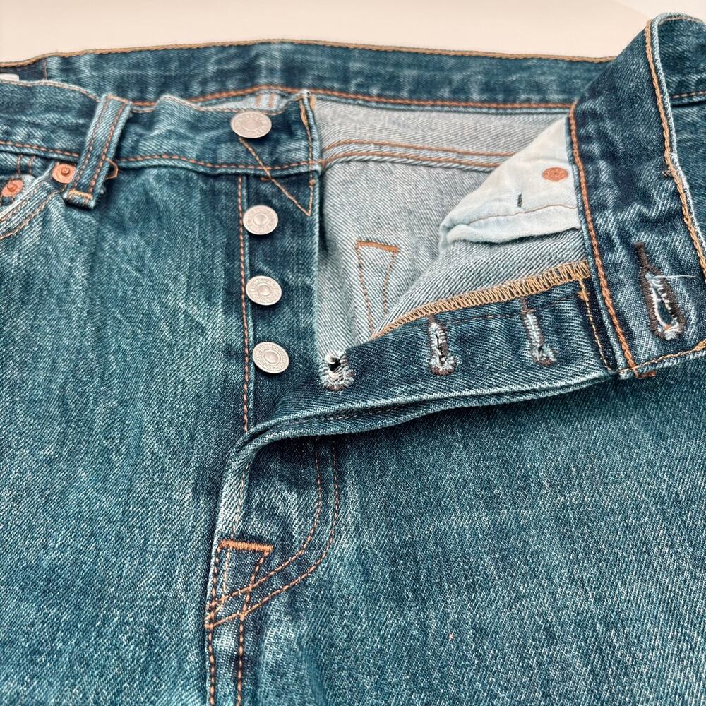 Levi 501 button fly men's jeans, waist size 33"